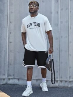 Manfinity Sporsity Men LetterGraphic Striped Trim Shorts -Man Plus Fashion 16509538901df1f36b9b0088ee9c68bc5629f0034f thumbnail 405x552