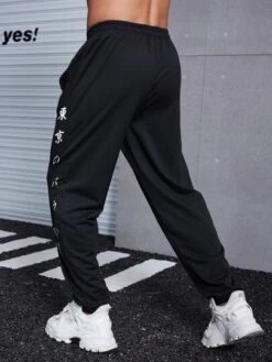 Manfinity Hypemode Men Japanese Character And Floral Print Drawstring Waist Sweatpants