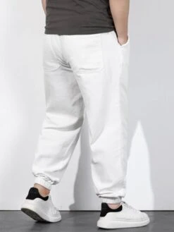 Men Slant Pocket Drawstring Waist Jogger Jeans