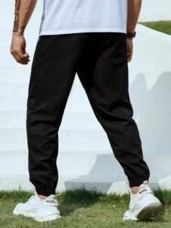 Men Slogan Graphic Drawstring Waist Pants