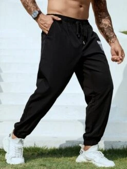 Men Slogan Graphic Drawstring Waist Pants -Man Plus Fashion 1678862632e12952660b13470204f3d3c8e7d70447 thumbnail 405x552