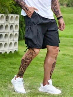 Manfinity LEGND Men Pocket Side Drawstring Waist Shorts -Man Plus Fashion 168208040657f9c21ecfc848ca4bd5843d1412dd00 thumbnail 405x552