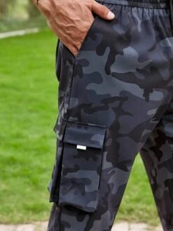 Manfinity LEGND Men Camo Print Flap Pocket Drawstring Waist Cargo Pants -Man Plus Fashion 16823320601cc5398cf71a17f8ad68ba29bf71b76b thumbnail 405x552