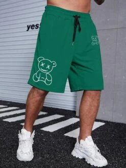 Manfinity Hypemode Men Cartoon Graphic Drawstring Waist Shorts -Man Plus Fashion 16823899913fd2eef9540fbb76113bfe86724c5e32 thumbnail 405x552