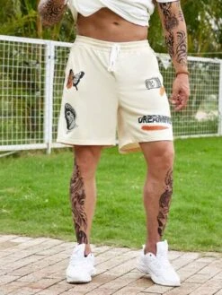 Manfinity Hypemode Men Letter & Figure Graphic Drawstring Waist Shorts -Man Plus Fashion 1682578041907dc385145edaa6e07be5f06542081a thumbnail 405x552