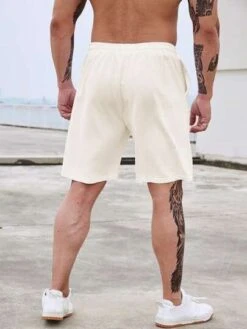 Manfinity Homme Men Drawstring Waist Slant Pocket Shorts