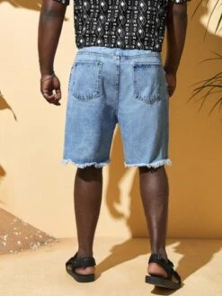 SHEIN Men Plus Cotton Ripped Raw Hem Denim Shorts