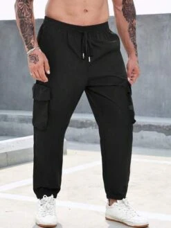 Manfinity LEGND Men Plus Flap Pocket Side Cargo Pants -Man Plus Fashion 1685325538b701e5e4911e95014d02c227005dcd36 thumbnail 405x552
